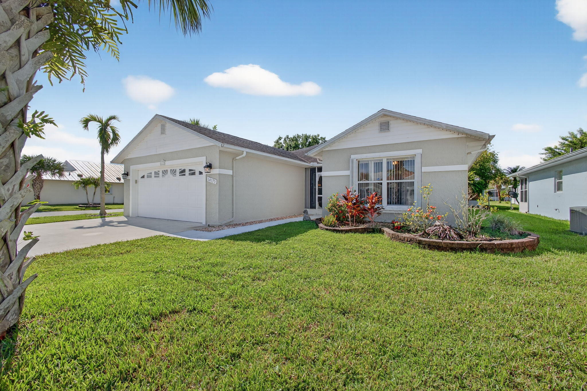 Welcome to this sun-filled move-in ready home located in the highly sought-after Active Adult community of Spanish Lakes Fairways. Situated on a desirable corner lot, this beautifully maintained and cared-for 3-bedroom, 2-bath CBS home offers comfort, style, and peace of mind. Step into a spacious interior featuring an abundance of natural light, elegant crown molding, and stylish plantation shutters throughout. The open layout includes a well-equipped kitchen with granite countertops, a convenient snack bar, and plenty of cabinet space--perfect for entertaining or everyday living. Enjoy added security and storm protection with accordion and roll-down shutters for year-round security.