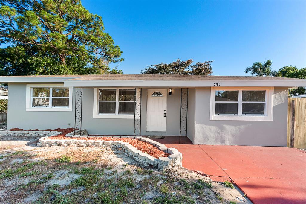 Beautiful 3 bedroom 1 bath CBS home located in Country Club Acres of Delray Beach. The main house is 1298 sqft under air and has 3 bedrooms and 1 bath. Home features an upgraded kitchen with stainless steel appliances, crown molding, travertine tile and wood flooring in the living areas, and a fireplace. Fresh paint inside and out and new fixtures and fans throughout. Great layout with tons of living area for the family. Large fenced in backyard would be perfect for anyone with a dog and there is plenty of room for a pool. There is also a bonus CBS building in the back that has an additional 360 sqft under air and electric. This could be whatever you decide to make of it - a workshop, an office, or even a studio apartment. Best value in all of Country Club Acres!