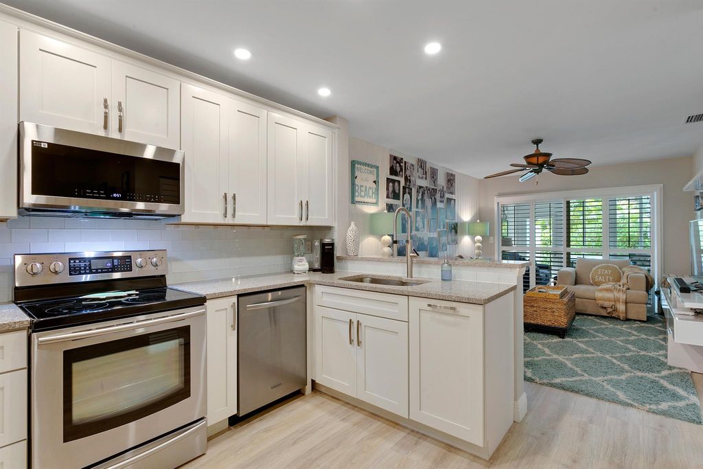 Photo of 126 Ocean Dunes Circle, Jupiter, FL 33477 (MLS # R11019423)