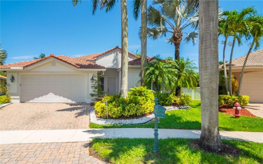 Beautiful pool home in Weston Hills! This 4-bedroom, 3-bath residence features a desirable 3-way split floor plan, offering both privacy and functionality. Bright and open layout with abundant natural light throughout. Tastefully updated with porcelain tile in all living areas and laminate wood floors in the bedrooms. The white-on-white kitchen is complemented by stainless steel appliances, creating a clean and modern feel. Ideally located on a quiet cul-de-sac, this home also offers a 2-car garage and a covered patio perfect for outdoor living and entertaining.