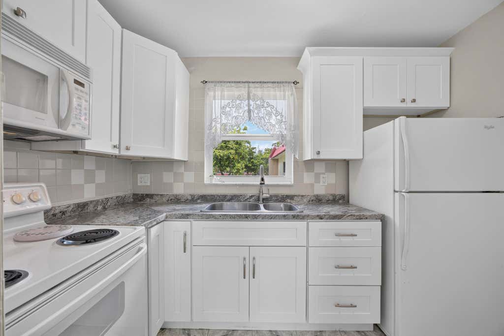 Photo of 355 Lake Frances Drive, West Palm Beach, FL 33411 (MLS # B26058126)
