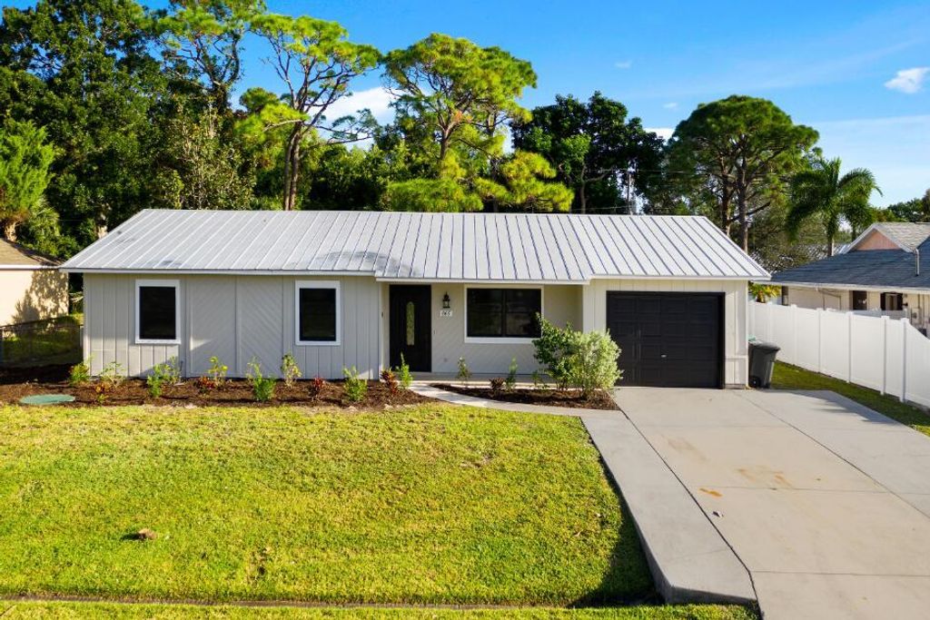 Photo of 865 SE Streamlet Avenue, Port Saint Lucie, FL 34983 (MLS # R10753730)