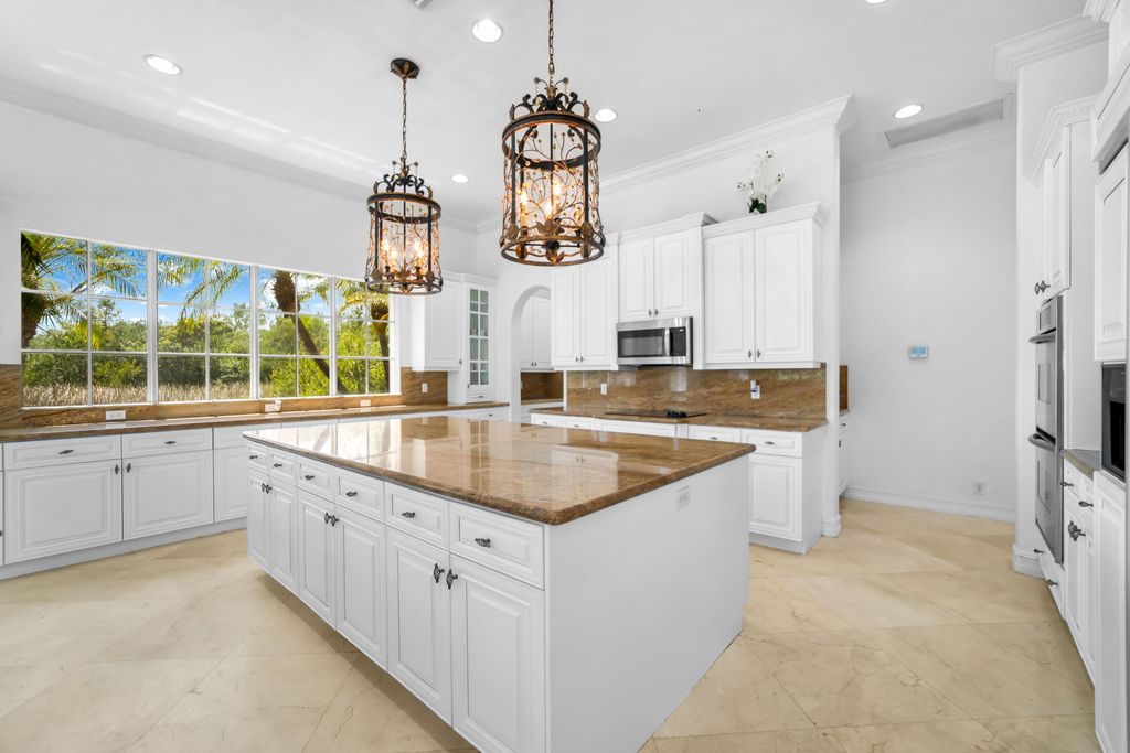 Photo of 11244 NW 77th Place, Parkland, FL 33076 (MLS # B26025676)