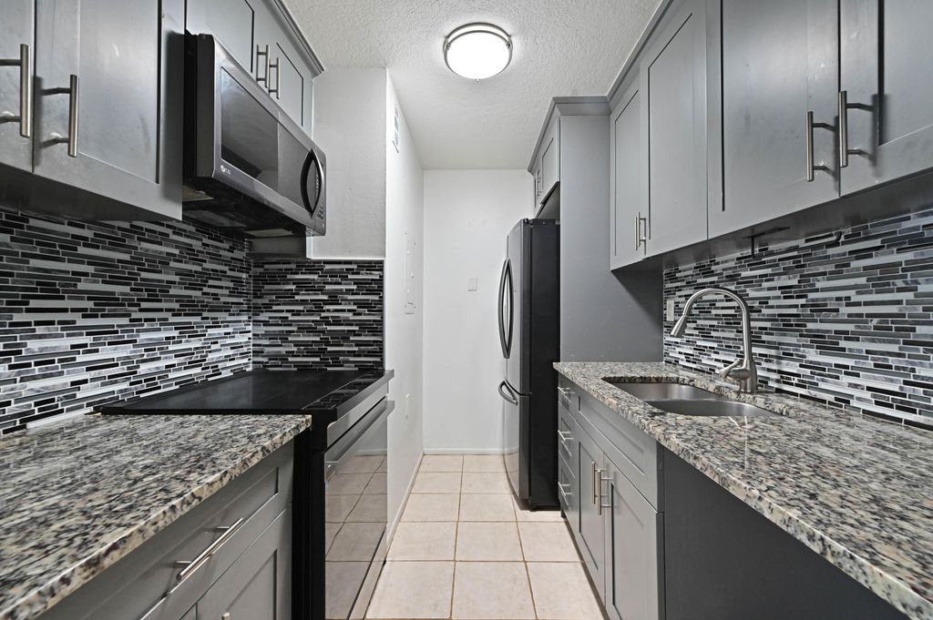 Photo of 1089 N Benoist Farms Road #205, West Palm Beach, FL 33411 (MLS # B26031524)