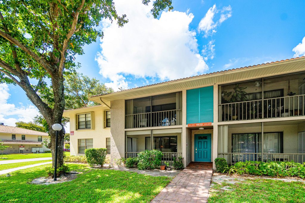 Photo of 9810 Pineapple Tree Drive #101, Boynton Beach, FL 33436 (MLS # B26031618)
