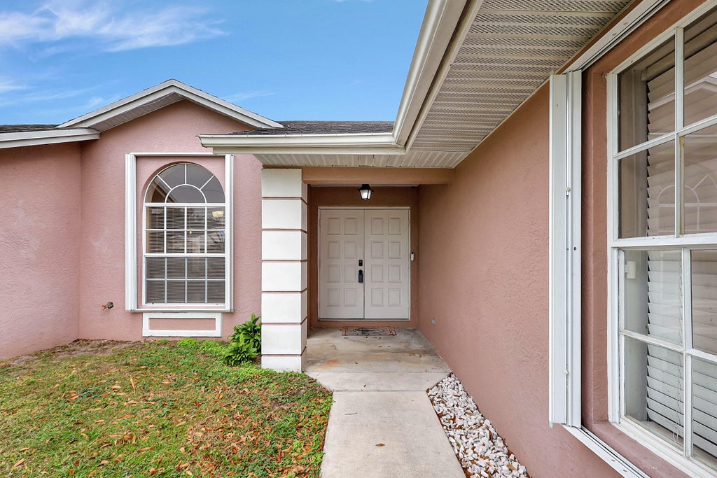 Photo of 1751 SW Southworth Terrace, Port Saint Lucie, FL 34953 (MLS # R10944005)