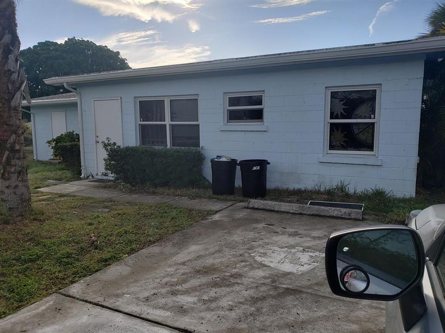 Unique property! Rural feel right in Hobe Sound! Very private location just east of the library. CBS structure could be used as a home, an office or both. 2-3 bedrooms, 2 baths, kitchen, dining room, living room, laundry room. Newer A/C/ 

Oversized lot. Front of house faces Rohl, back of house including 1 car garage faces Page street.  No restrictions on pets or vehicles. Super private! Adjacent lot #17 is included within fence and is included in the price.