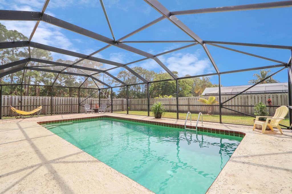 Photo of 6501 Paso Robles Boulevard, Fort Pierce, FL 34951 (MLS # R10960856)