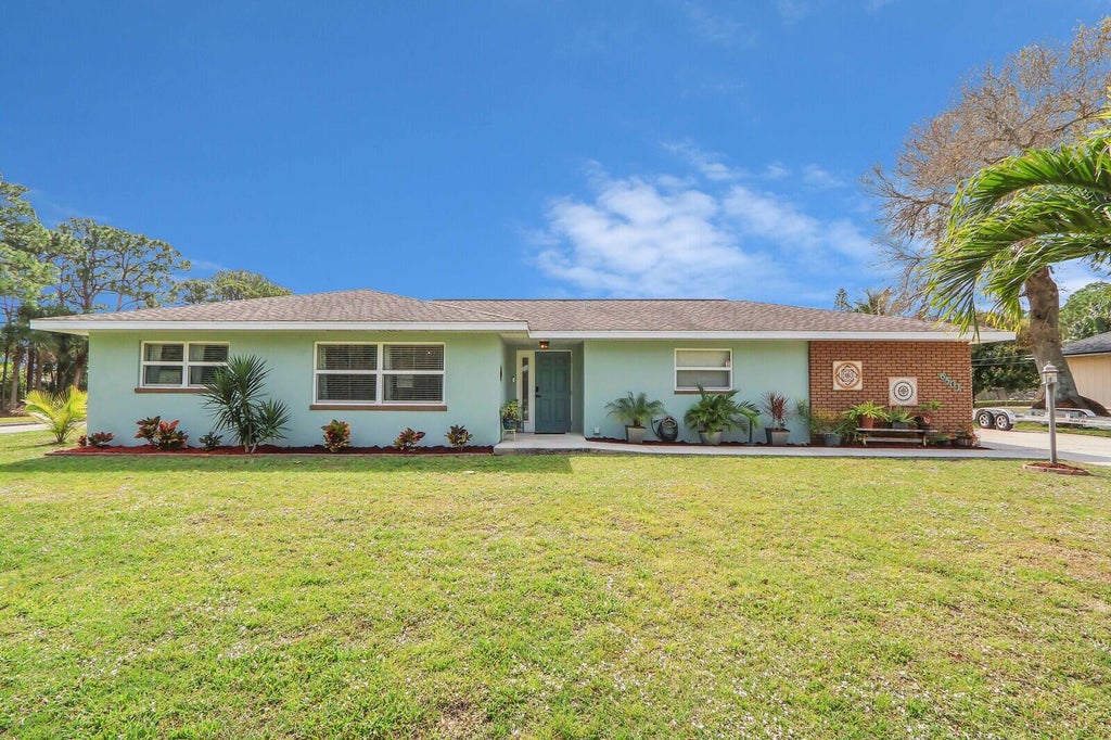 Photo of 6501 Paso Robles Boulevard, Fort Pierce, FL 34951 (MLS # R10960856)