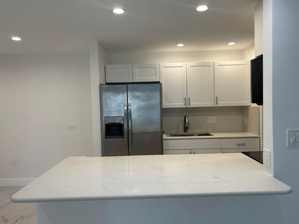 Photo of 12354 Alternate A1a #L3, Palm Beach Gardens, FL 33410 (MLS # R10993608)