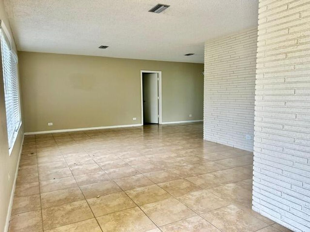 Photo of 861 NW 72nd Avenue, Plantation, FL 33317 (MLS # B26032036)
