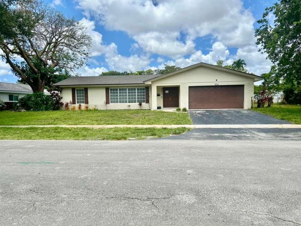 Photo of 861 NW 72nd Avenue, Plantation, FL 33317 (MLS # B26032036)