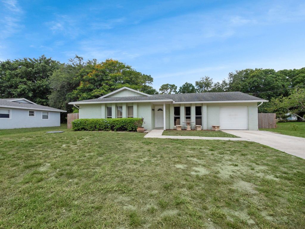 Photo of 1938 SW Capri Street, Port Saint Lucie, FL 34953 (MLS # R10993725)
