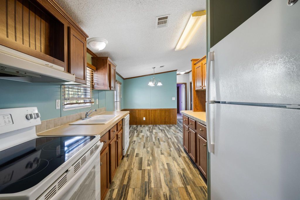 Photo of 7140 SE Ridgeway Terrace, Hobe Sound, FL 33455 (MLS # R10949749)