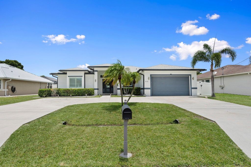 Photo of 979 SW McDevitt Avenue, Port Saint Lucie, FL 34953 (MLS # R11096874)