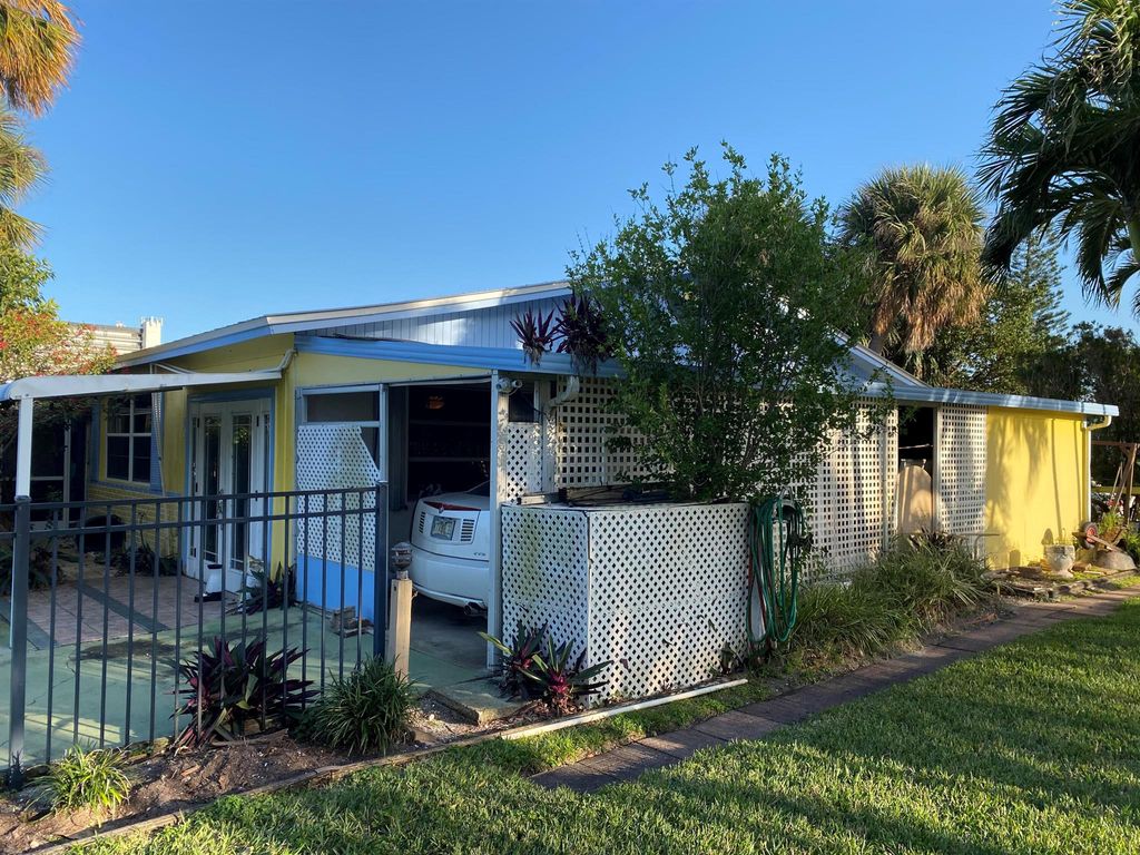 Photo of 123 N Las Olas Drive, Jensen Beach, FL 34957 (MLS # R10963693)