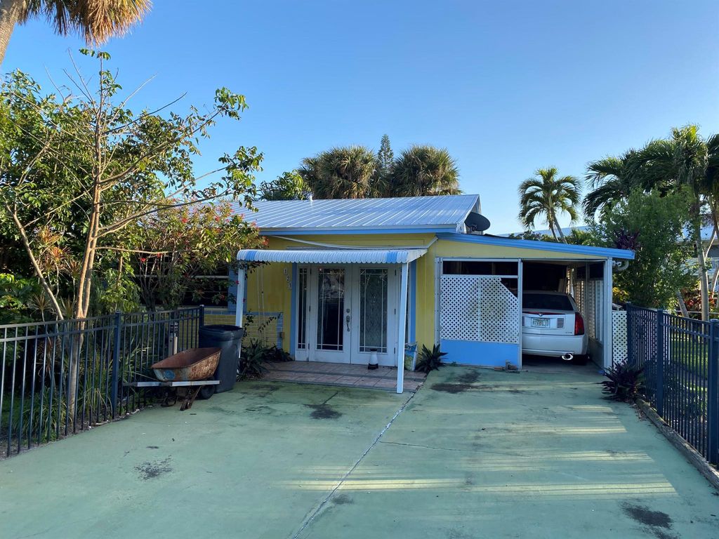 Photo of 123 N Las Olas Drive, Jensen Beach, FL 34957 (MLS # R10963693)