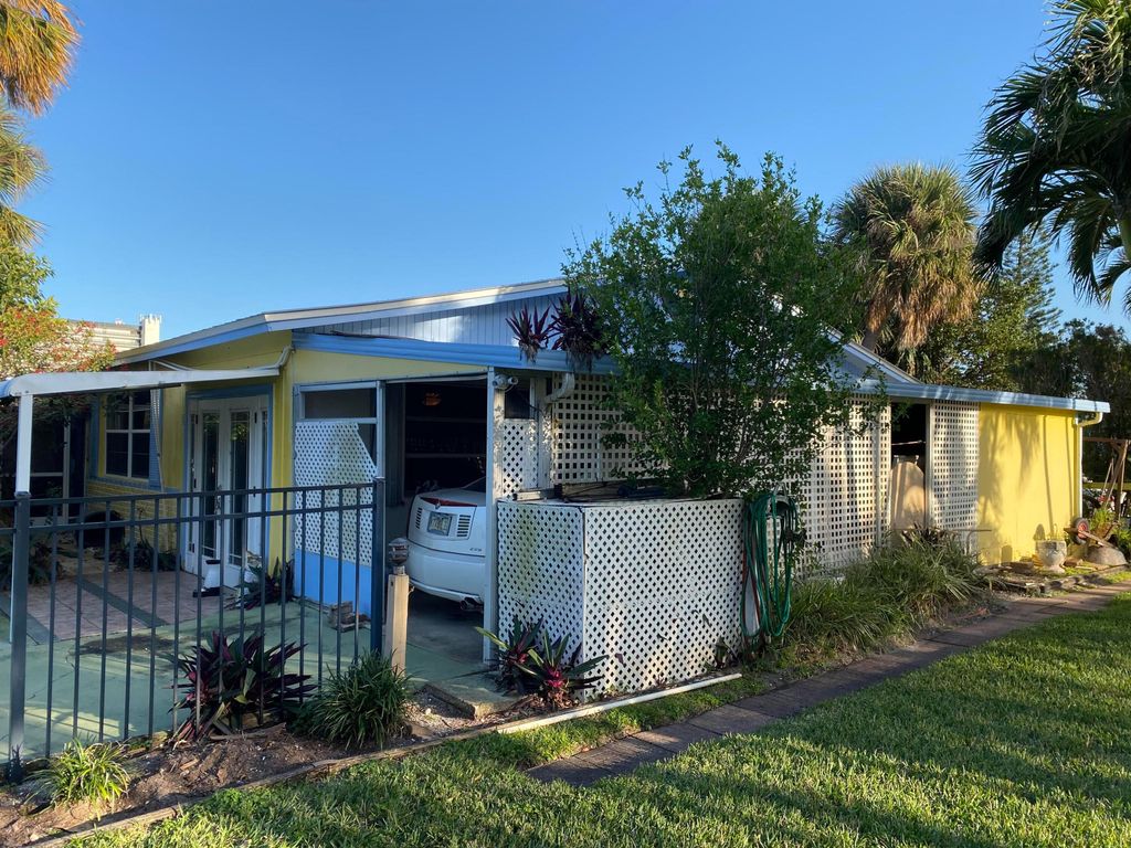 Photo of 123 N Las Olas Drive, Jensen Beach, FL 34957 (MLS # R10963693)