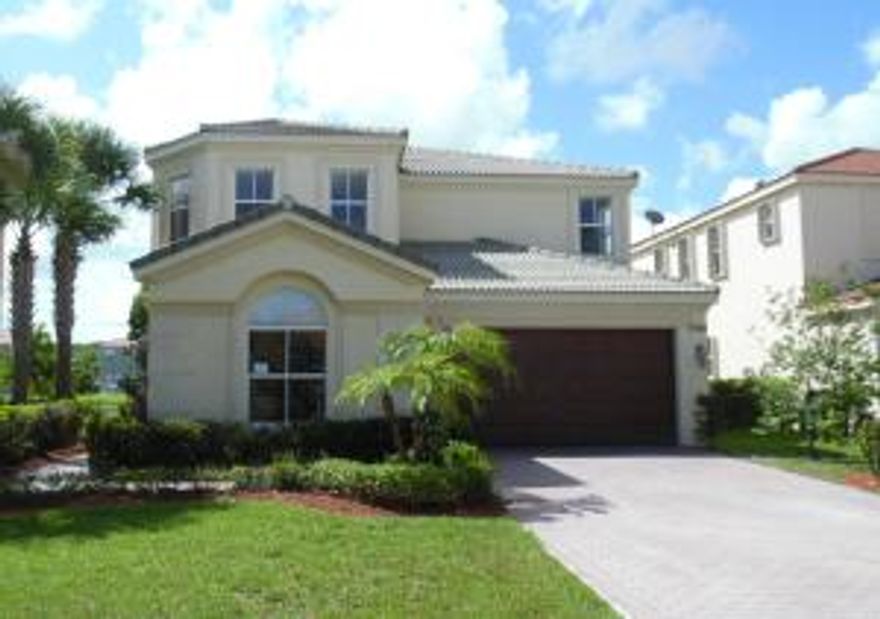 Come see this 5 bedroom / 4.5 bathroom single family home is highly sought after Olympia Community of Wellington. This lake view home has a nice screened patio that is perfect for relaxing and reading a book. Spacious master bedroom and living room. The home features tile, wood and carpet flooring. The community features many amenities such as tennis, community pool and park. Close to shopping, restaurants, beaches and transportation, this community provides all that you need to call this home. Call now for details on this great opportunity. Sizes approximate.