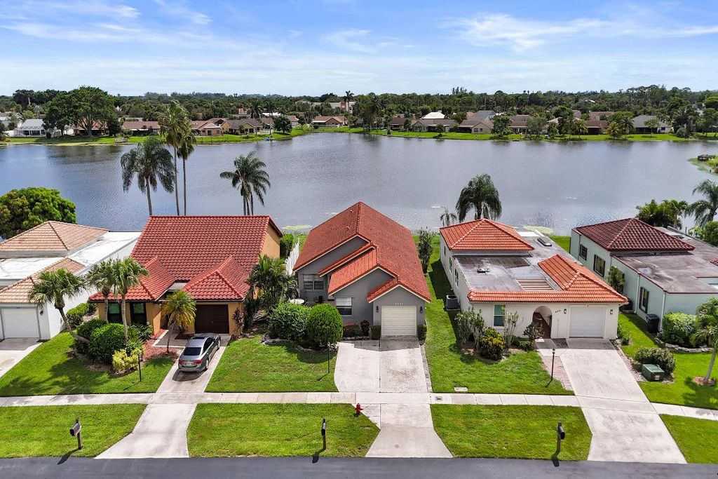 Photo of 8333 Bonita Isle Drive, Lake Worth, FL 33467 (MLS # R11124258)