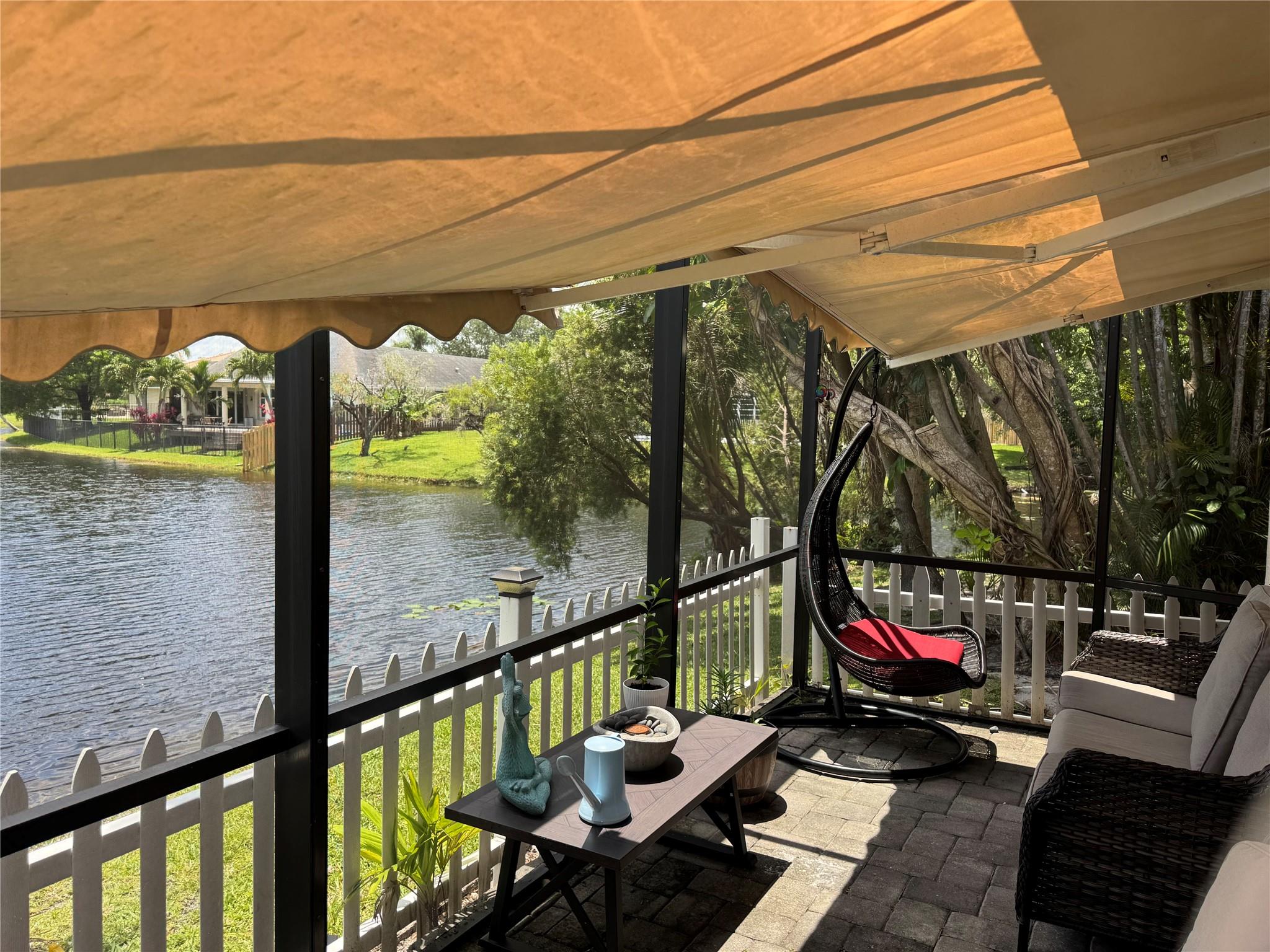 Don't miss this incredible opportunity in the heart of Plantation! This beautifully maintained LEGAL 3-bed, 2-bath home features hurricane impact windows , renovated kitchen and a spacious screened-in patio overlooking a gorgeous lake -perfect for relaxing or entertaining. Prime central location just minutes from Sawgrass Mills, major highways, top- rated schools, parks, shopping and dining. Easy to show, bring your buyers and let them fall in love with the view and the unbeatable location! This home offers the ideal blend of convenience and comfort. Low HOA in a well kept community. DON'T MISS THE 3D TOUR - ALSO FLOOR PLAN AVAILABLE