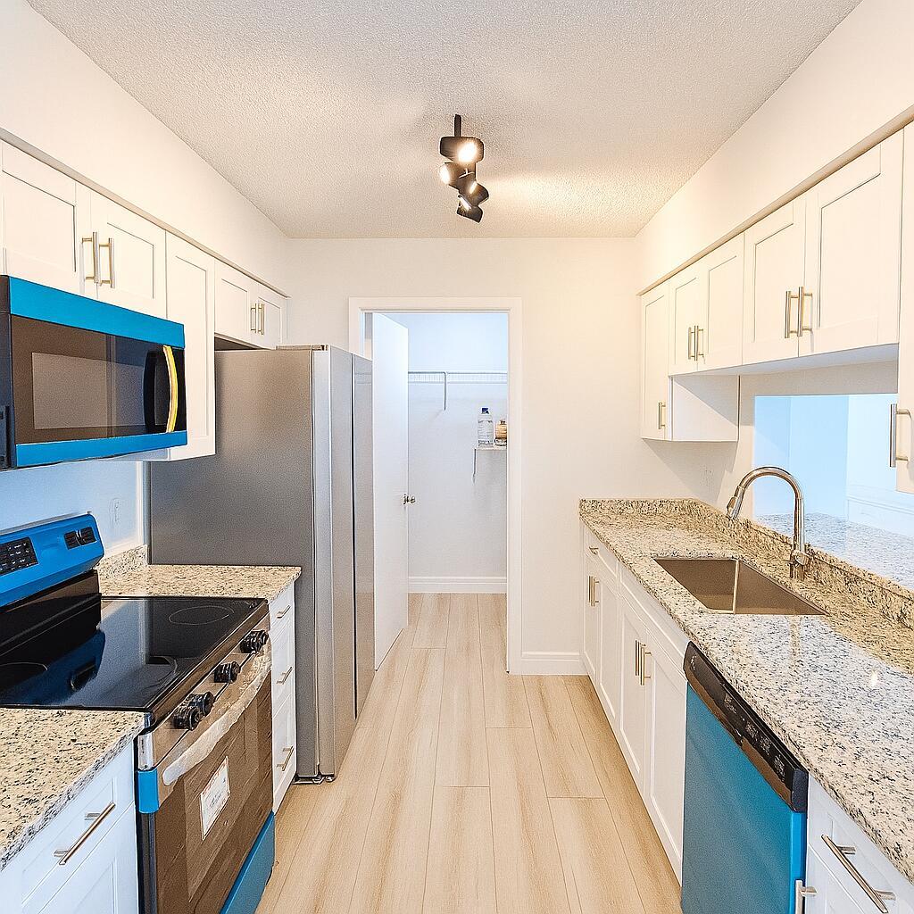 This beautiful, recently renovated villa is located in the heart of Jensen Beach. The unit features new Premium SPC Flooring, modern kitchen cabinets with granite countertops, brand-new stainless steel appliances, and renovated bathrooms. It also includes new lighting fixtures and a new water heater. The villa is just a couple of miles from the beach, Stuart Marina, The Treasure Coast Mall, unique shops & dining.Amenities include a lakefront clubhouse available for private events with a new roof in 2022, oversized community pool re-surfaced in 2021, fitness room, dock & walking paths around the fishing lake, and tree-lined sidewalks.HOA include water, cable, internet, insurance, landscaping, lawn maintenance, irrigation, tree trimming and pest control.