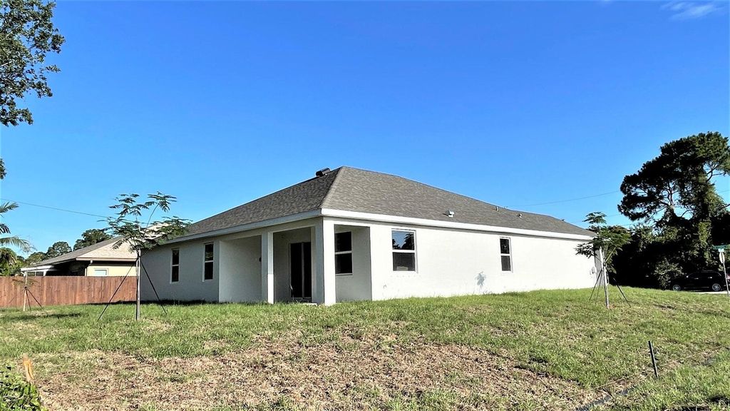 Photo of 1802 SW Citadel Avenue, Port Saint Lucie, FL 34953 (MLS # R11058719)