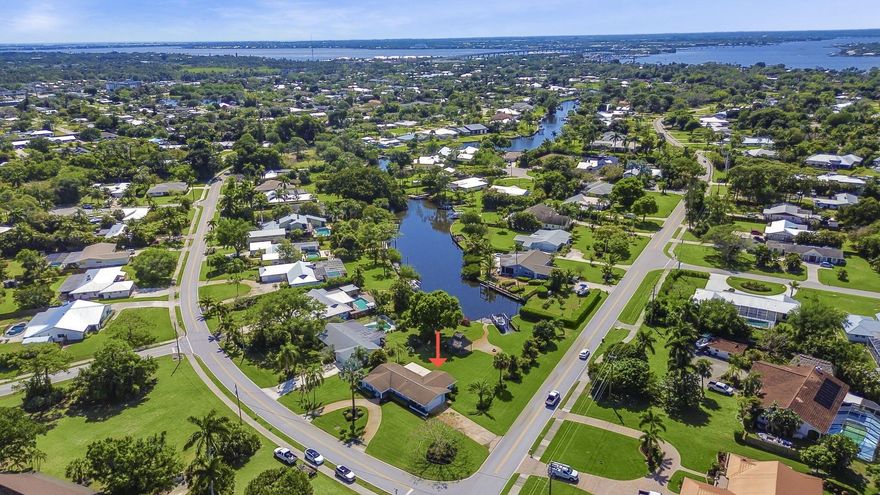 RARE FIND WATERFRONT UNDER 1mm on gorgeous corner lot with the potential to build a pool and a guesthouse! NOT IN THE HOA ! No mangroves, solid concrete seawall, 3/2/2 CBS home is quaint and charming with stunning terrazzo floors. All new impact windows and doors. North River Shores has a community boat ramp, parks throughout the neighborhood, A rated school district, playground, sidewalks , 20 minutes to open water and only minutes to shopping, beaches and downtown Stuart You will love living here :) Endless possibilities only limited to your imagination.