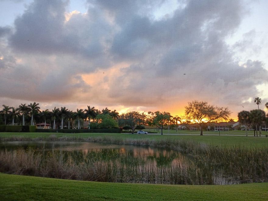 Southwinds at Boca Pointe Country Club,  NON-mandatory membership community -  VILLA-CONDO with magnificent SUNSET views over the lake and the golf course. This first-floor 2-bedroom, 2-bathroom home has been FULLY RENOVATED to a high level with premium finishes throughout. The property features brand-new, high-quality HURRICANE WINDOWS and sliders with a transferable 10-year warranty, electric blinds in the main living areas, and plantation shutters in the bedrooms. Enjoy tranquil lake views and sunsets over the golf course from the main living areas, enhancing the indoor-outdoor lifestyle within one of Boca Raton’s most desirable communities. Nearby Town Center Mall, A+ Schools, and the best restaurants. 15 minutes to the beach.
