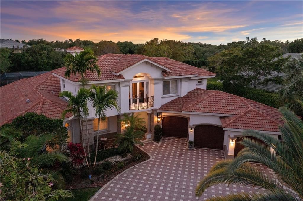 Photo of 9310 NW 62nd Ct, Parkland, FL 33067 (MLS # F10372827)