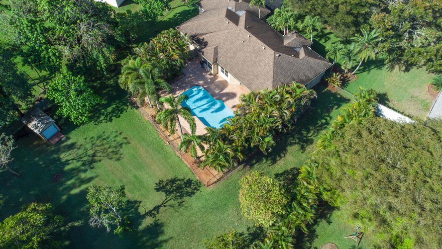 Beautifully maintained four bedroom pool home perfectly located in a very diserable area of Pembroke Pines sitting on a builder's acre. The home features 42" wood kitchen cabinets finished with crown moldings. The AC was replaced in 2023 with a ten year transferrable warranty and the roof replaced in 2013. The oversized main bedroom features a private entrance on to the pool patio and has two walking closets. The split bedroom floor plan offers three spacious guest bedrooms all with large closets. The pool and heated spa privately located in an oasis was diamond brite resurfaced in 2026 and a new spa heater installed. The oversized patio is perfect for entertaining, there is a hot and cold wash down outdoor shower and ample space to bar-b-que. The interior was freshly painted in 2026.  The lot has a zoned sprinkler system and a outdoor shed. There are Miami Dade approved hurricane shutters. The road is a new freshly paved deadend road, no through traffic. No HOA and A-rated schools. Beautiful opportunity it is a must see!