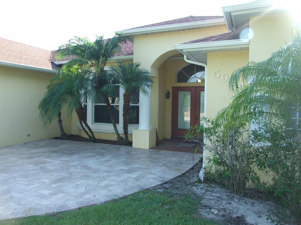 Photo of 5924 NW Conus Street, Port Saint Lucie, FL 34986 (MLS # R10731372)