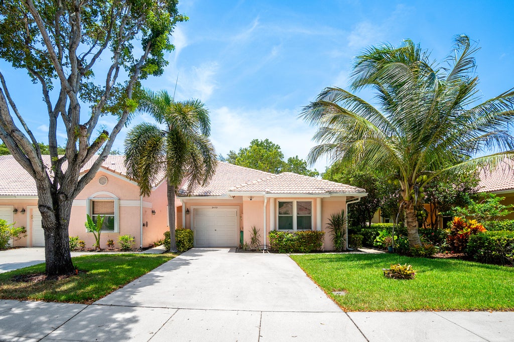 Photo of 2473 S CORAL TRACE Circle, Delray Beach, FL 33445 (MLS # B26055502)