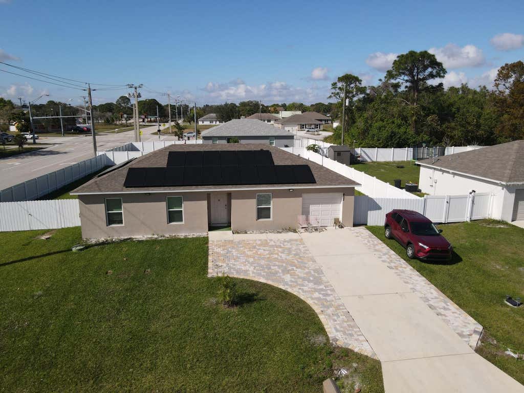 Photo of 402 NE Mainsail Street, Port Saint Lucie, FL 34983 (MLS # B26047288)