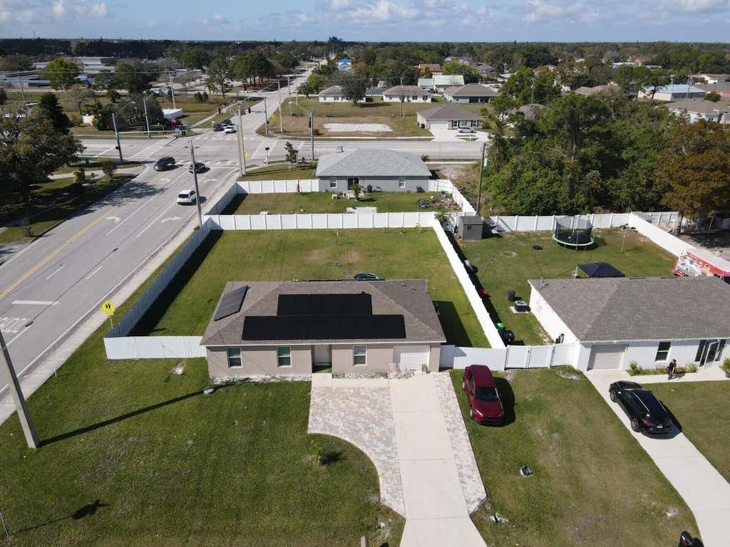 Photo of 402 NE Mainsail Street, Port Saint Lucie, FL 34983 (MLS # B26047288)