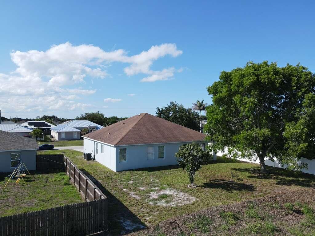 Photo of 948 SW Jeremko Avenue, Port Saint Lucie, FL 34953 (MLS # B26005949)