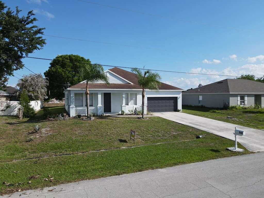 Photo of 948 SW Jeremko Avenue, Port Saint Lucie, FL 34953 (MLS # B26005949)