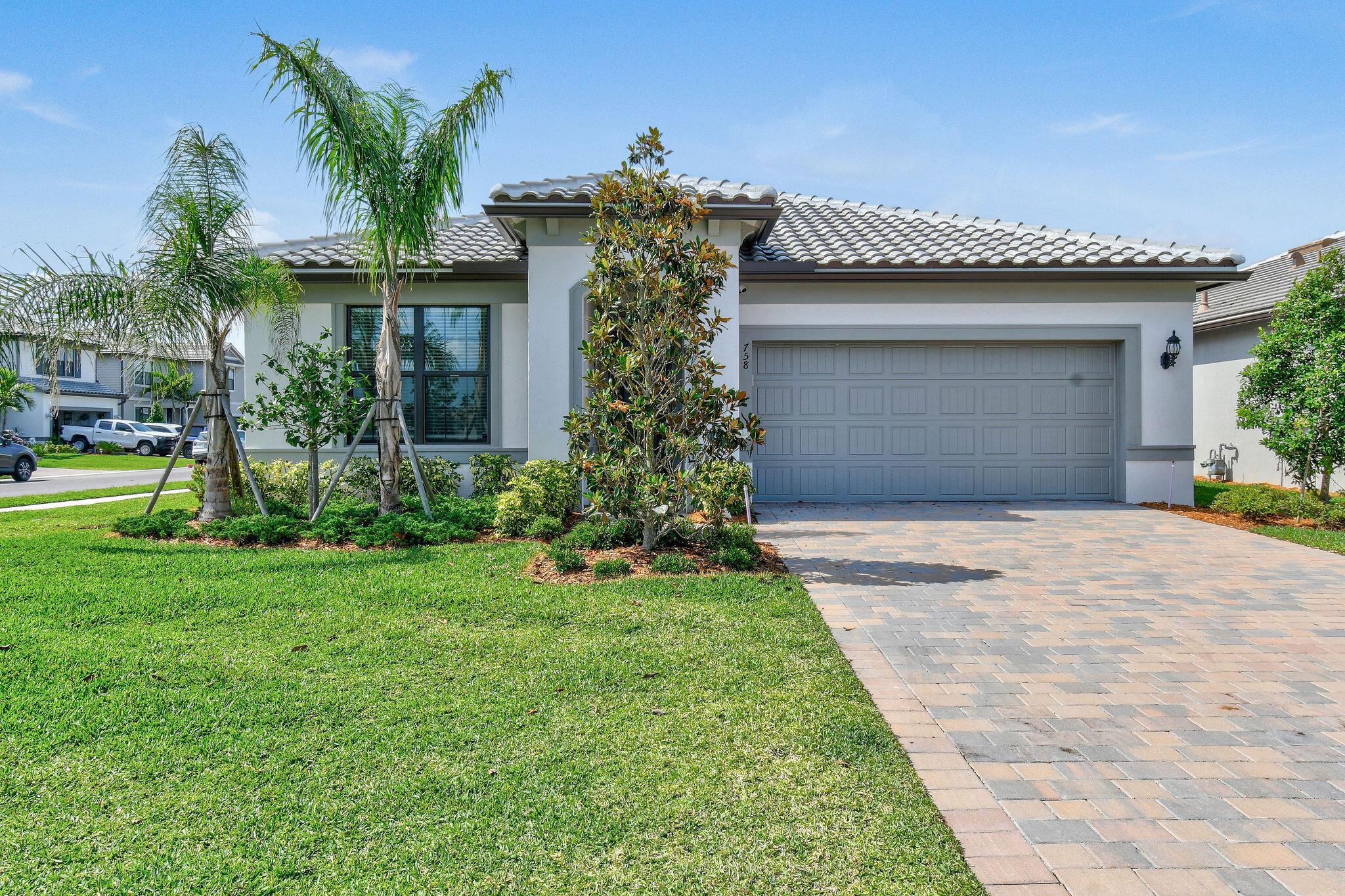 Built in 2024 this 4-bedroom 2-bath home with Ceramic tile throughout features a spacious kitchen with island. gas stove, large master bedroom with walk in closet. Enjoy living in a gated community with clubhouse resort-style heated pool, spa, lap pool, cabanas, pickleball, tennis, basketball, fitness center, dog park, playground, sidewalks and streetlights.