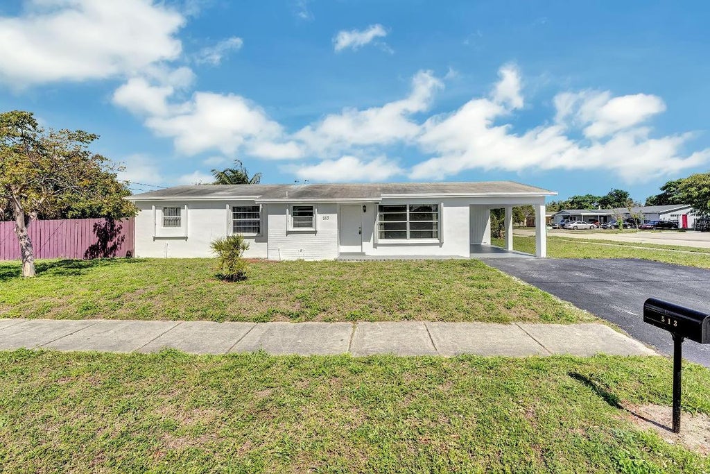 Photo of 513 NW 2 Way, Deerfield Beach, FL 33441 (MLS # R10994894)