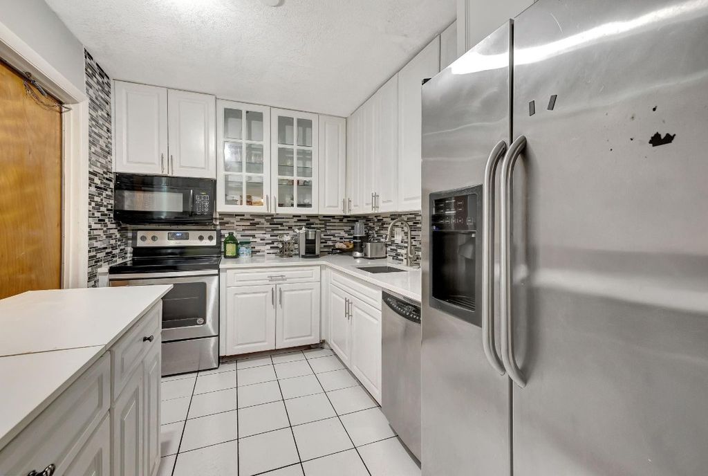 Photo of 4401 NW 41st Street #103, Lauderdale Lakes, FL 33319 (MLS # F10470012)