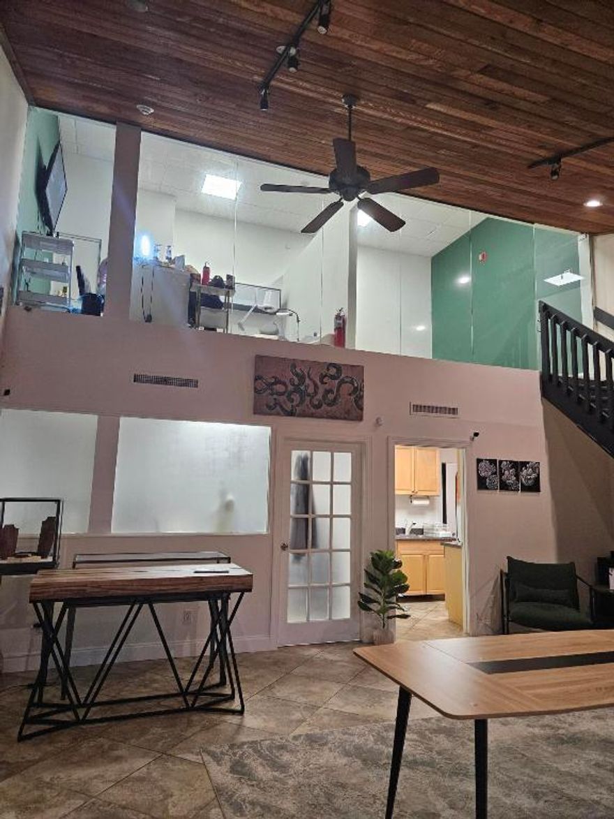 Office Space for Lease only.  The space can be used for Medical, Retail , Beauty or office. Has 2 bathrooms, Kitchen area, a loft
with two spaces you could sublet. Office downstairs, open space downstairs with high
Ceilings. CAM included all you pay is electric.
Comes with a covered under the building parking space. 82 Surface Parking spaces.