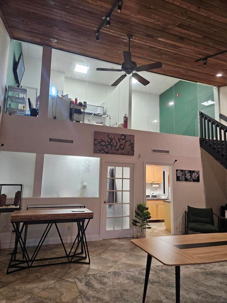 Office Space for Lease only.  The space can be used for Medical, Retail , Beauty or office. Has 2 bathrooms, Kitchen area, a loftwith two spaces you could sublet. Office downstairs, open space downstairs with highCeilings. CAM included all you pay is electric.Comes with a covered under the building parking space. 82 Surface Parking spaces.