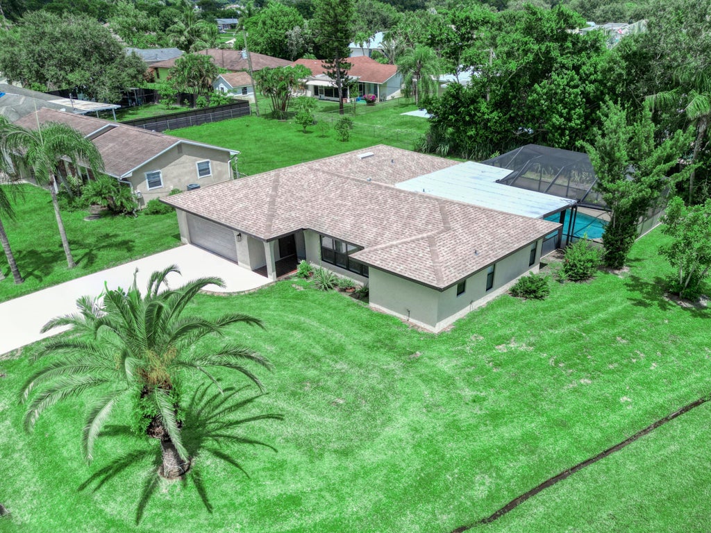 Photo of 2467 SE Wishbone Road, Port Saint Lucie, FL 34953 (MLS # R11020462)
