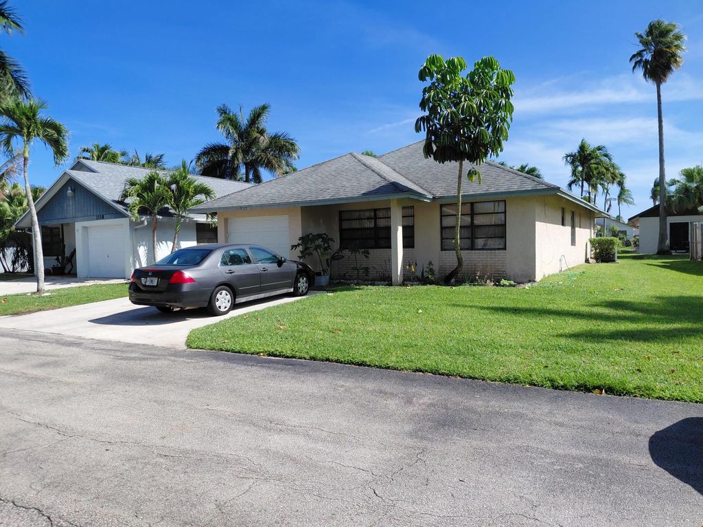 Photo of 1322 Pines Lane, West Palm Beach, FL 33415 (MLS # B26002935)