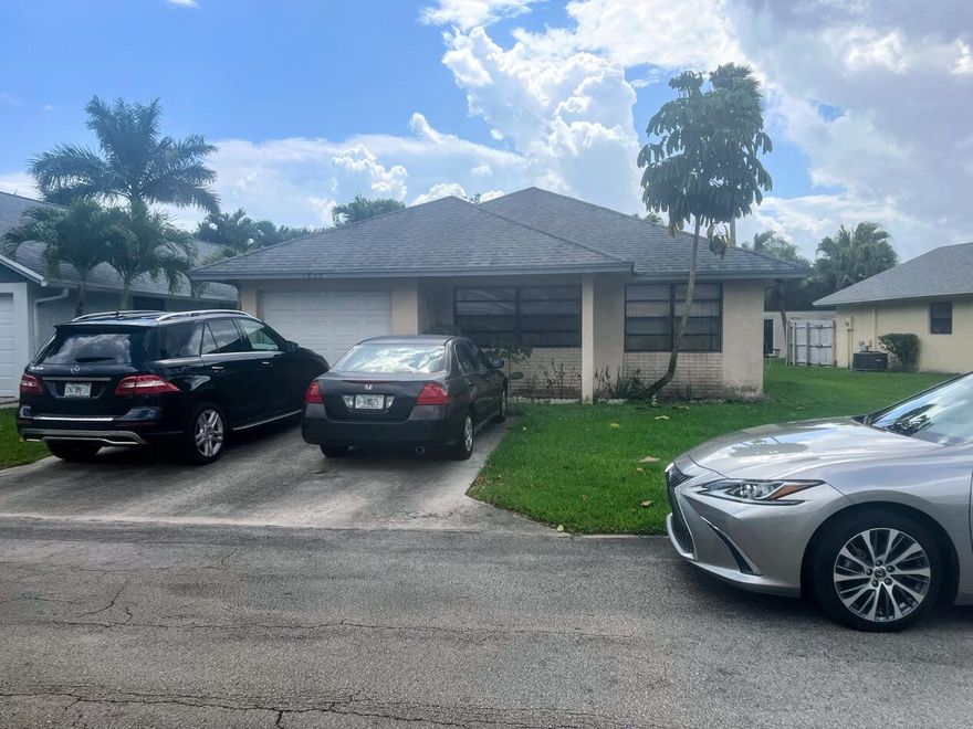 Beautiful home featuring a modern kitchen with white cabinets, stainless steel appliances, and quartz countertops. Enjoy updated bathrooms, tiled flooring throughout, and a screened-in porch perfect for relaxing. Conveniently located near schools, parks, and shopping.