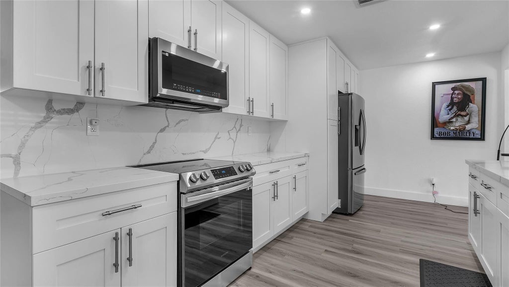 Photo of 4861 NW 6TH Court, Plantation, FL 33317 (MLS # B26075654)