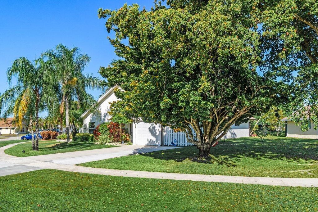 Photo of 22525 Swordfish Drive, Boca Raton, FL 33428 (MLS # B26036220)