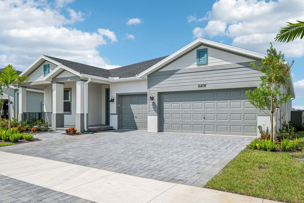 Photo of 6406 NW Sweetwood Drive, Port Saint Lucie, FL 34987 (MLS # R11019744)
