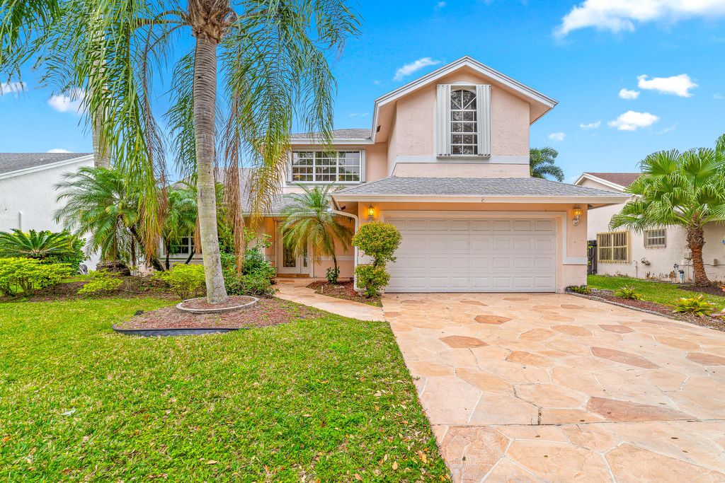 Photo of 7170 NW 44th Lane, Coconut Creek, FL 33073 (MLS # R10865583)