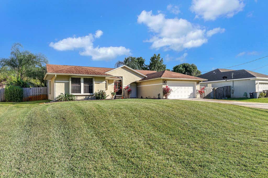 Photo of 2449 SW Massey Street, Port Saint Lucie, FL 34953 (MLS # R10942443)